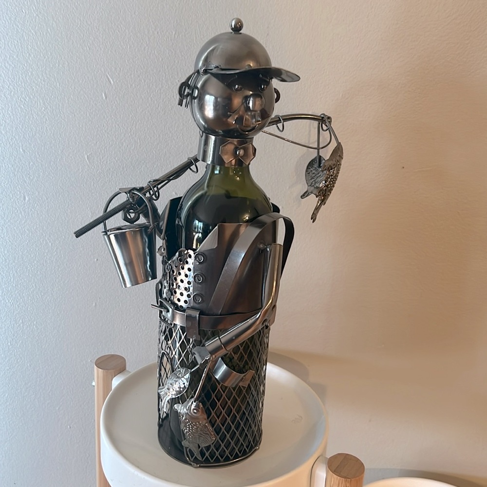 Fishing metal man 13.5” high